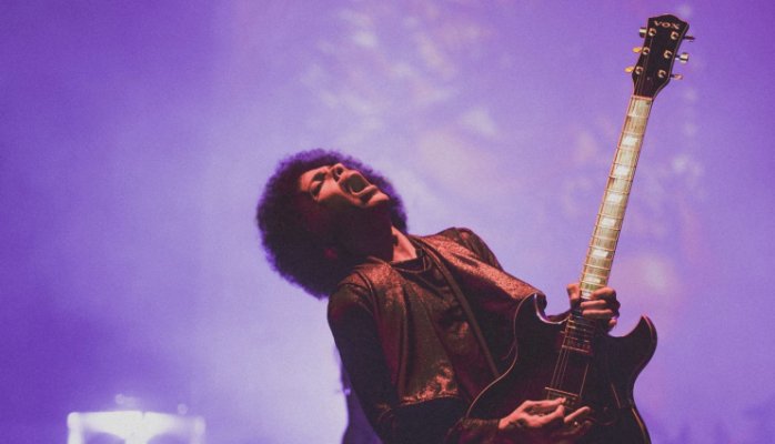 Prince playing guitar